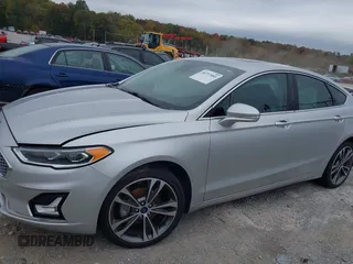 2019 Ford Fusion Titanium with VIN 3FA6P0K96KR120749, listed as a IAAI auction lot 40737085 with 118,376 mi miles and . Bid and sale history available at DreamBid. Image 17.