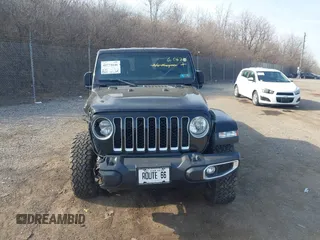 2021 Jeep Gladiator Overland z VIN 1C6HJTFG1ML606215, wystawiony jako IAAI lot #41771646 z przebiegiem 77 411 mil mil oraz . Historia ofert i sprzedaży dostępna na DreamBid. Obrazek 12.