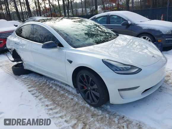 2020 Tesla Model 3 Performance z VIN 5YJ3E1EC5LF791879, wystawiony jako IAAI lot #41302692 z przebiegiem 76 502 mil mil oraz . Historia ofert i sprzedaży dostępna na DreamBid. Obrazek 1.