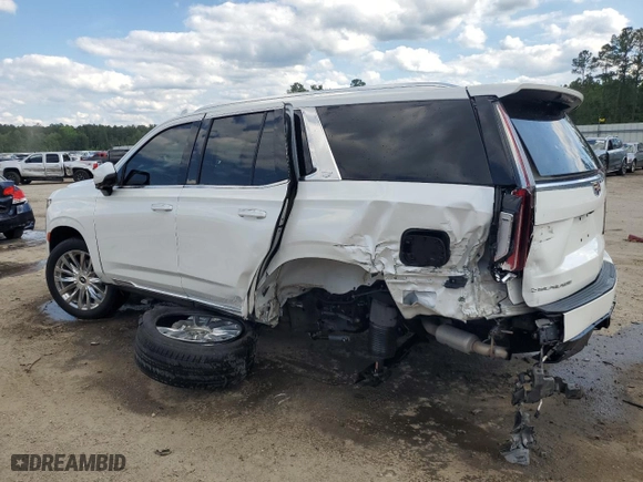 2021 Cadillac Escalade Premium Luxury with VIN 1GYS4CKL4MR240864, listed as a Copart auction lot 54990944 with 74,712 mi miles and Salvage Title. Bid and sale history available at carsss.com. Image 2.