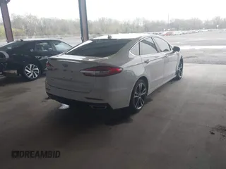 2019 Ford Fusion Titanium with VIN 3FA6P0K95KR271291, listed as a IAAI auction lot 41983320 with 71,962 mi miles and . Bid and sale history available at DreamBid. Image 4.