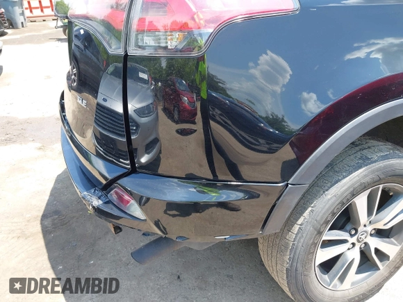 2018 Toyota RAV4 XLE with VIN 2T3WFREV3JW468450, listed as a IAAI auction lot 42528560 with 77,513 mi miles and . Bid and sale history available at DreamBid. Image 18.