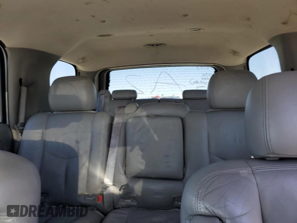 2004 Chevrolet Tahoe LT with VIN 1GNEC13TX4J312715, listed as a Copart auction lot 71969584 with 207,245 mi miles and Salvage Title. Bid and sale history available at carsss.com. Image 10.
