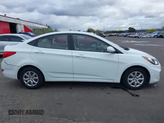 2013 Hyundai Accent GLS with VIN KMHCT4AE6DU291877, listed as a IAAI auction lot 41931876 with 136,781 mi miles. Bid and sale history available at carsss.com. Image 13.
