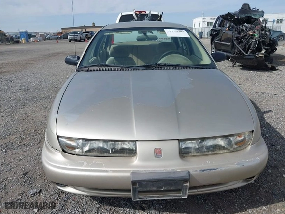 1997 Saturn SL with VIN 1G8ZJ5273VZ311463, listed as a IAAI auction lot 41900904 with 131,738 mi miles. Bid and sale history available at carsss.com. Image 6.