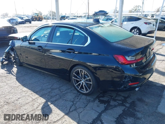 2021 BMW 3 Series 330i with VIN 3MW5R1J00M8B85692, listed as a IAAI auction lot 41824283 with 21,040 mi miles. Bid and sale history available at carsss.com. Image 3.