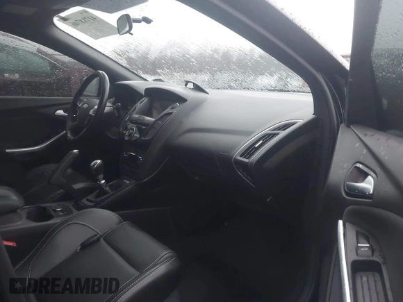 2014 Ford Focus ST with VIN 1FADP3L94EL180667, listed as a IAAI auction lot 41718746 with 141,574 mi miles and . Bid and sale history available at carsss.com. Image 5.