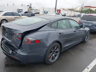 2022 Tesla Model S with VIN 5YJSA1E52NF459460, listed as a IAAI auction lot 41736236 with Not Provided miles and . Bid and sale history available at DreamBid. Image 4.