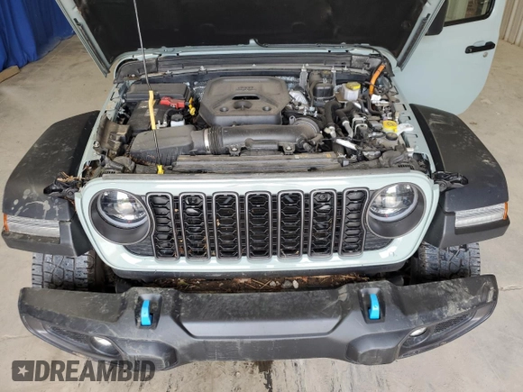 2024 Jeep Wrangler Rubicon with VIN 1C4RJXR67RW293197, listed as a Copart auction lot 59886995 with Not provided miles and Salvage title. Bid and sale history available at DreamBid. Image 12.
