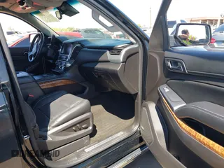 2015 Chevrolet Tahoe LTZ z VIN 1GNSKCKC7FR715512, wystawiony jako IAAI lot #42054583 z przebiegiem 106 941 mil mil oraz . Historia ofert i sprzedaży dostępna na DreamBid. Obrazek 5.