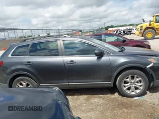 2015 Mazda CX-9 Touring with VIN JM3TB2CA7F0460232, listed as a IAAI auction lot 42344122 with 103,478 mi miles and . Bid and sale history available at DreamBid. Image 14.