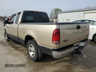 2000 Ford F-150 XL with VIN 2FTRX17W0YCA73568, listed as a Copart auction lot 51128035 with 208,737 mi miles and Salvage Title. Bid and sale history available at carsss.com. Image 2.