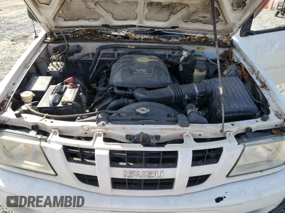 2004 Isuzu Rodeo S with VIN 4S2DM58W144310706, listed as a Copart auction lot 74980644 with 155,262 mi miles and Salvage Title. Bid and sale history available at DreamBid. Image 11.