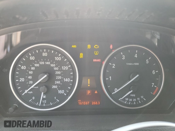 2012 BMW X5 35i with VIN 5UXZV4C54CL744502, listed as a Copart auction lot 57828115 with 161,597 mi miles and Clean title. Bid and sale history available at DreamBid. Image 9.