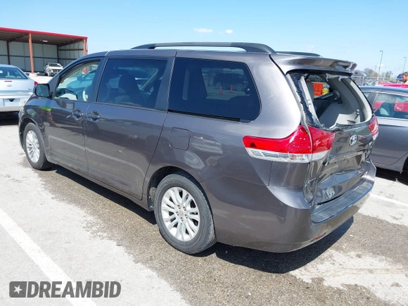 2012 Toyota Sienna XLE AAS with VIN 5TDYK3DC8CS263406, listed as a IAAI auction lot 41971770 with 186,394 mi miles. Bid and sale history available at carsss.com. Image 3.