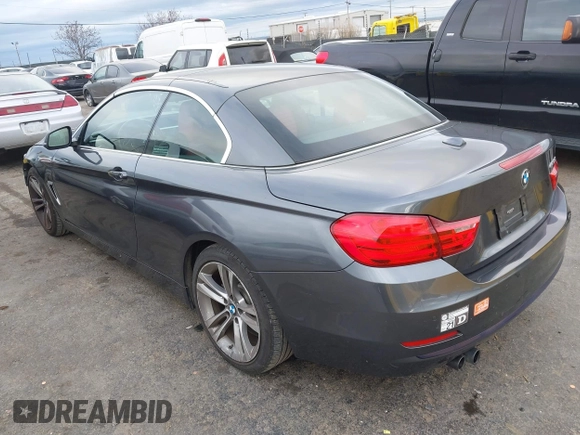 2015 BMW 4 Series 428i with VIN WBA3V7C54FP772531, listed as a IAAI auction lot 41487899 with 90,893 mi miles. Bid and sale history available at carsss.com. Image 3.