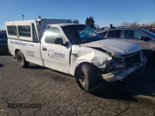1999 Ford F-150 with VIN 1FTRF17W9XKB35000, listed as a Copart auction lot 86001964 with 155,055 mi miles and Salvage title. Bid and sale history available at DreamBid. Image 4.