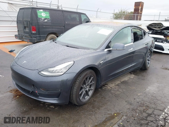 2018 Tesla Model 3 Long Range Battery with VIN 5YJ3E1EB7JF114305, listed as a IAAI auction lot 41765994 with 76,945 mi miles and . Bid and sale history available at DreamBid. Image 24.
