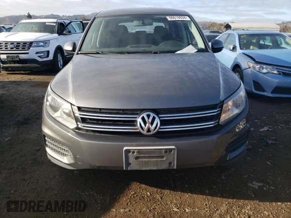2012 Volkswagen Tiguan S with VIN WVGAV7AX7CW002660, listed as a Copart auction lot 86016034 with 185,938 mi miles and Salvage title. Bid and sale history available at DreamBid. Image 5.