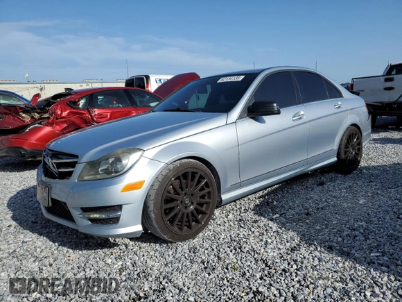 2014 Mercedes-Benz C 250 Sport with VIN WDDGF4HB8EA955064, listed as a Copart auction lot 63184135 with 104,735 mi miles and Salvage title. Bid and sale history available at DreamBid. Image 1.