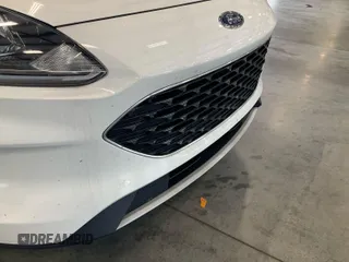 2020 Ford Escape SE z VIN 1FMCU0G62LUB45075, wystawiony jako IAAI lot #42743374 z przebiegiem 84 675 mil mil oraz . Historia ofert i sprzedaży dostępna na DreamBid. Obrazek 6.