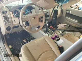 2010 Mercury Mariner Premier z VIN 4M2CN8H77AKJ24734, wystawiony jako Copart lot #54317785 z przebiegiem 206 212 mil mil oraz Szkoda całkowita • Salvage title. Historia ofert i sprzedaży dostępna na DreamBid. Obrazek 8.
