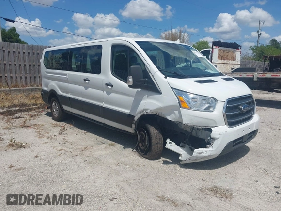 2020 Ford Transit Passenger XL z VIN 1FBAX2Y86LKA22944, wystawiony jako IAAI lot #42179762 z przebiegiem 102 295 mil mil oraz . Historia ofert i sprzedaży dostępna na DreamBid. Obrazek 1.