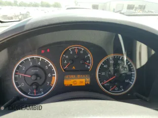 2015 Nissan Titan Pro-4X with VIN 1N6BA0EC5FN514184, listed as a Copart auction lot 56721065 with 127,283 mi miles and Salvage title. Bid and sale history available at DreamBid. Image 9.