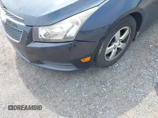 2014 Chevrolet Cruze 1LT with VIN 1G1PC5SB3E7469236, listed as a IAAI auction lot 42492007 with Not provided miles and . Bid and sale history available at DreamBid. Image 12.