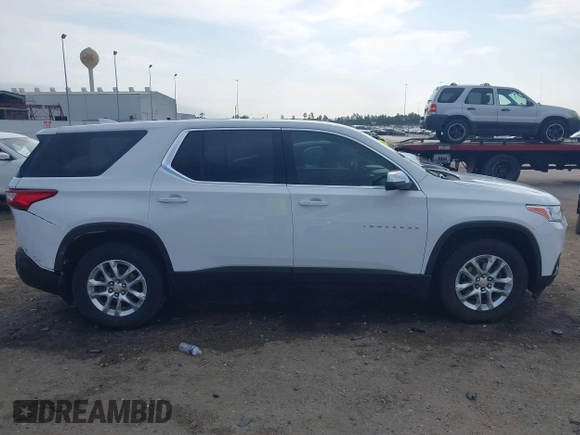 2021 Chevrolet Traverse LS z VIN 1GNERFKW7MJ169763, wystawiony jako IAAI lot #42041579 z przebiegiem 59 840 mil mil oraz . Historia ofert i sprzedaży dostępna na DreamBid. Obrazek 13.