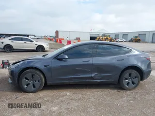 2023 Tesla Model 3 with VIN 5YJ3E1EA5PF676316, listed as a IAAI auction lot 42384765 with 33,715 mi miles and . Bid and sale history available at DreamBid. Image 14.