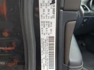 2014 Jeep Grand Cherokee Overland with VIN 1C4RJECG1EC556155, listed as a Copart auction lot 75641034 with 116,549 mi miles and Salvage Title. Bid and sale history available at carsss.com. Image 13.
