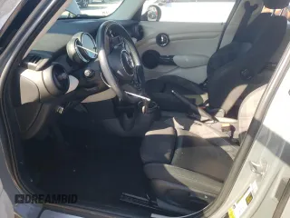 2016 MINI Hardtop 4 Door with VIN WMWXU1C59G2D11117, listed as a Copart auction lot 65191715 with 121,633 mi miles and Salvage title. Bid and sale history available at DreamBid. Image 7.