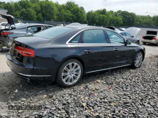 2015 Audi A8 3.0T with VIN WAU3GAFD0FN036465, listed as a Copart auction lot 64069035 with 100,149 mi miles and Salvage title. Bid and sale history available at DreamBid. Image 3.