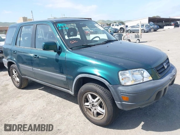1999 Honda CR-V EX with VIN JHLRD1866XC028200, listed as a IAAI auction lot 42040657 with 207,397 mi miles. Bid and sale history available at carsss.com. Image 1.