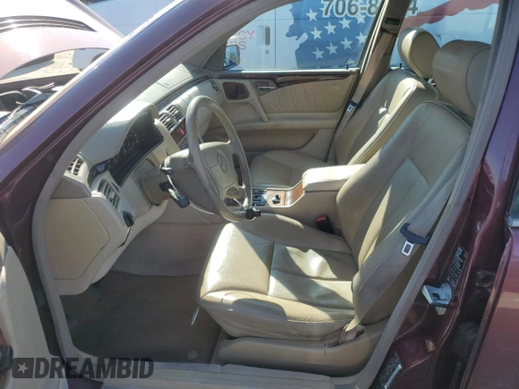 1998 Mercedes-Benz E 320 with VIN WDBJF25FXWA549962, listed as a Copart auction lot 87876005 with 303,884 mi miles and Salvage Title. Bid and sale history available at DreamBid. Image 7.