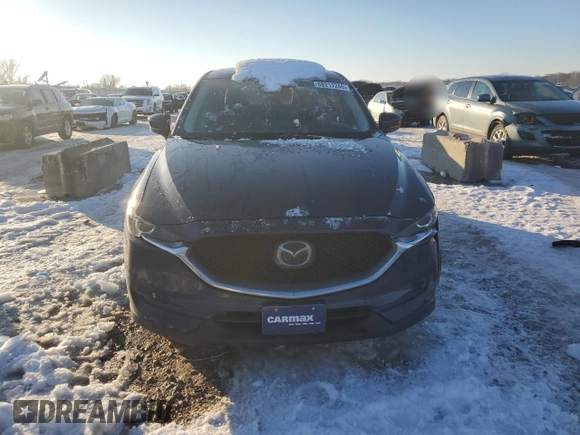 2021 Mazda CX-5 Touring with VIN JM3KFACM2M0329646, listed as a Copart auction lot 88217245 with 46,864 mi miles and Salvage Title. Bid and sale history available at carsss.com. Image 5.