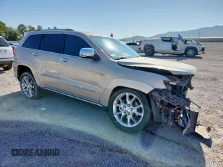 2015 Jeep Grand Cherokee Summit with VIN 1C4RJEJG9FC952192, listed as a Copart auction lot 63714045 with 147,732 mi miles and Salvage title. Bid and sale history available at DreamBid. Image 4.