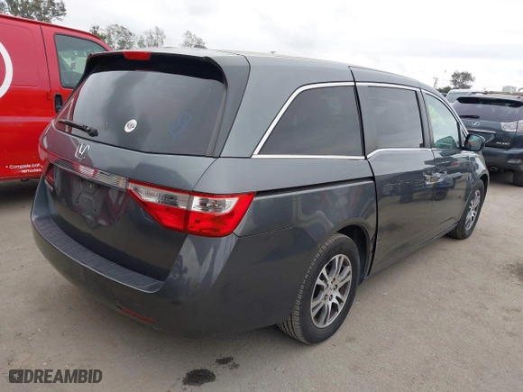 2011 Honda Odyssey EX-L with VIN 5FNRL5H66BB015305, listed as a IAAI auction lot 42065872 with 190,580 mi miles. Bid and sale history available at carsss.com. Image 4.