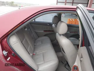 2003 Toyota Camry LE with VIN 4T1BE30K03U227243, listed as a IAAI auction lot 42063924 with 177,323 mi miles and . Bid and sale history available at DreamBid. Image 8.