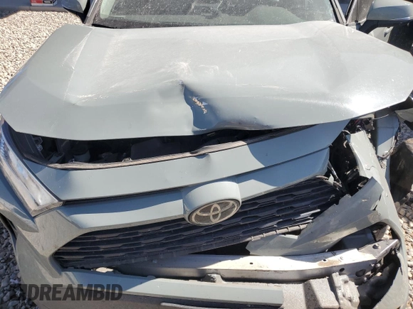 2021 Toyota RAV4 XLE with VIN 2T3W1RFV4MW134798, listed as a Copart auction lot 58802435 with 74,495 mi miles and Salvage title. Bid and sale history available at DreamBid. Image 12.