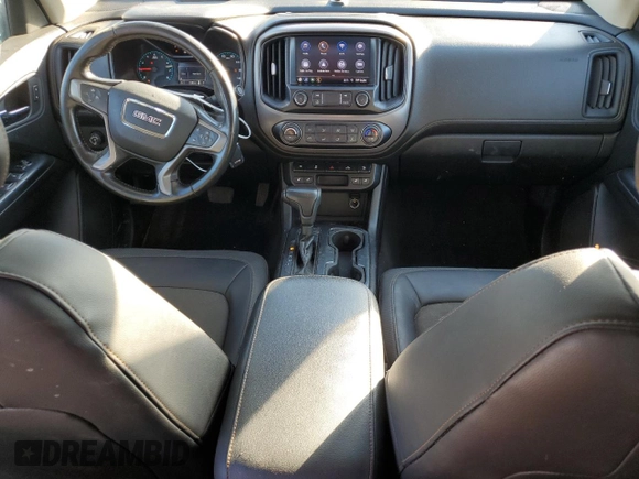 2021 GMC Canyon 4WD AT4 w/Cloth with VIN 1GTG6FEN9M1216062, listed as a Copart auction lot 80932634 with 73,308 mi miles and Salvage Title. Bid and sale history available at carsss.com. Image 8.