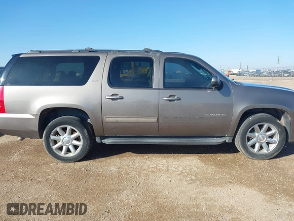 2012 GMC Yukon XL SLT with VIN 1GKS2KE73CR167820, listed as a IAAI auction lot 41462950 with 243,554 mi miles. Bid and sale history available at carsss.com. Image 13.