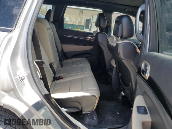 2016 Jeep Grand Cherokee Limited 75th Anniversary with VIN 1C4RJFBG2GC344181, listed as a Copart auction lot 53053525 with 138,726 mi miles and Salvage Title. Bid and sale history available at DreamBid. Image 10.