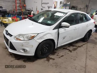 2012 Ford Focus SE с VIN 1FAHP3F21CL301085, выставлен на аукционе IAAI как лот 42321328 с пробегом 157 818 миль миль и . История ставок и продаж доступна на DreamBid. Изображение 17.