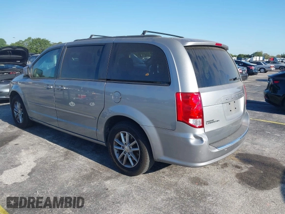 2015 Dodge Grand Caravan SXT with VIN 2C4RDGCG3FR592098, listed as a IAAI auction lot 42038665 with 104,092 mi miles and . Bid and sale history available at DreamBid. Image 3.