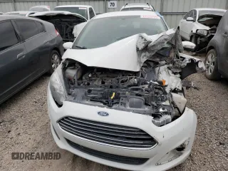 2014 Ford Fiesta S z VIN 3FADP4TJ4EM212337, wystawiony jako Copart lot #47325725 z przebiegiem 77 931 mil mil oraz Szkoda całkowita • Salvage title. Historia ofert i sprzedaży dostępna na DreamBid. Obrazek 5.