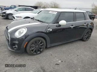 2017 MINI Hardtop 4 Door Cooper with VIN WMWXU1C30H2E19304, listed as a Copart auction lot 51008575 with 34,526 mi miles and Salvage Title. Bid and sale history available at DreamBid. Image 1.