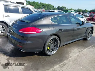 2014 Porsche Panamera S E-Hybrid with VIN WP0AD2A76EL044591, listed as a IAAI auction lot 42436817 with 89,009 mi miles and . Bid and sale history available at DreamBid. Image 4.