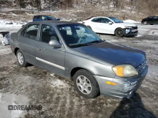 2003 Hyundai Accent GL with VIN KMHCG45C33U469496, listed as a Copart auction lot 45926595 with 77,737 mi miles and Salvage Title. Bid and sale history available at carsss.com. Image 4.